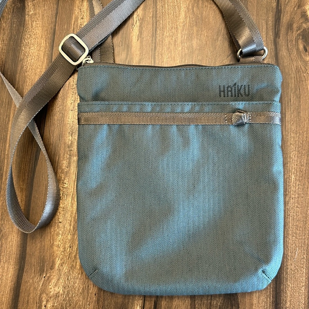 Haiku Revel Crossbody Balsam Travel Bag